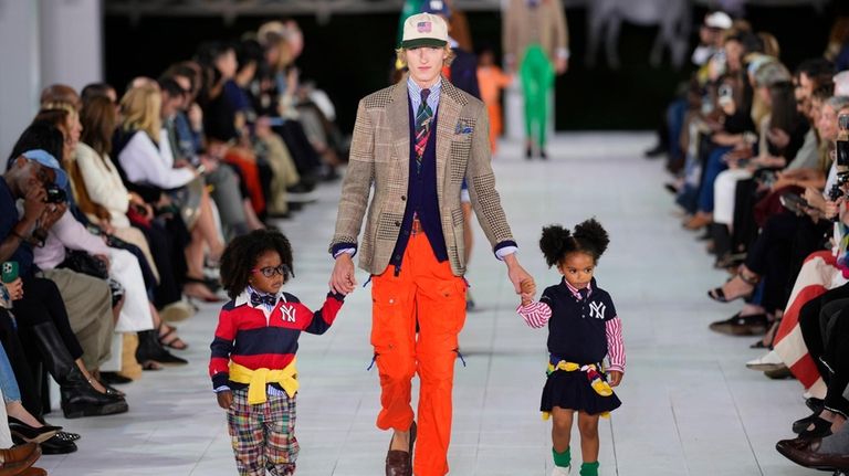 Models walk the runway during the Ralph Lauren Spring/Summer 2025...