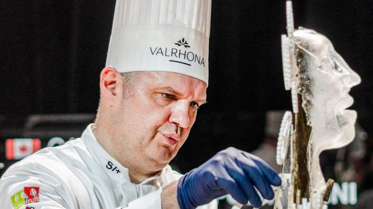 Christophe Sportellini, of Canada, adds a gear to a display...