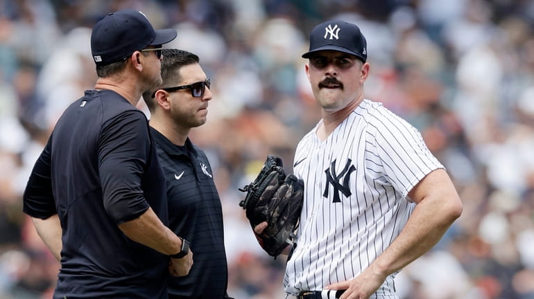 Carlos Rodon hit hard before leaving with hamstring tightness in Yankees'  loss to Astros - Newsday