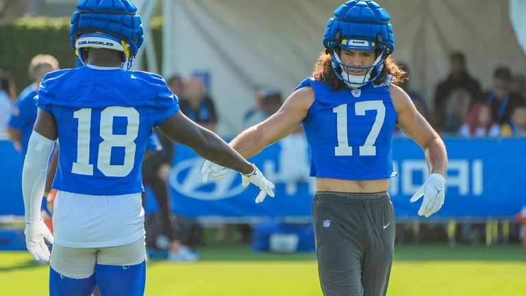 Los Angeles Rams wide receivers Tyler Johnson (18) and Puka...