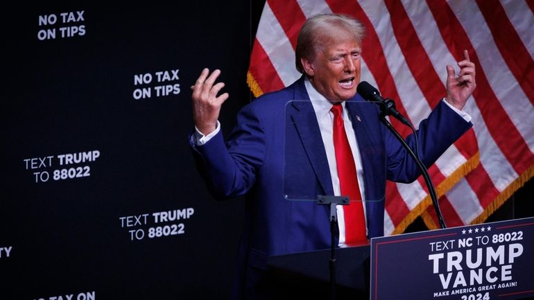 Former President Donald Trump speaks at a rally in Asheville, North...