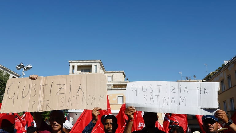 Members of the Indian community in Italy protest in Latina,...