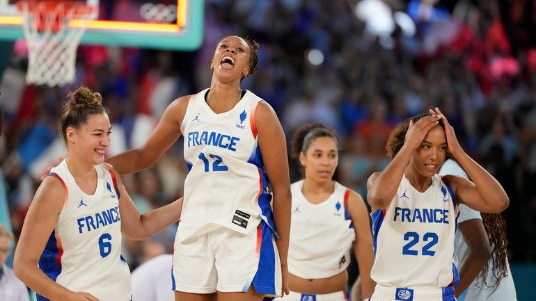 Alexia Chery (6), Iliana Rupert (12), and Marieme Badiane (22),...