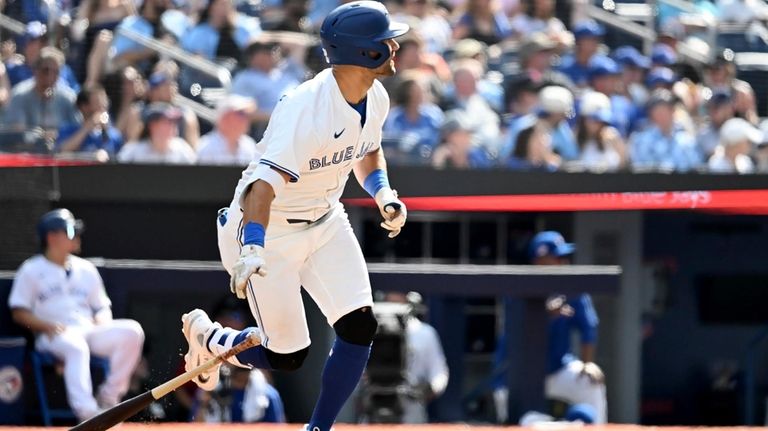 Toronto Blue Jays' Kevin Kiermaier (39) hits a double against...