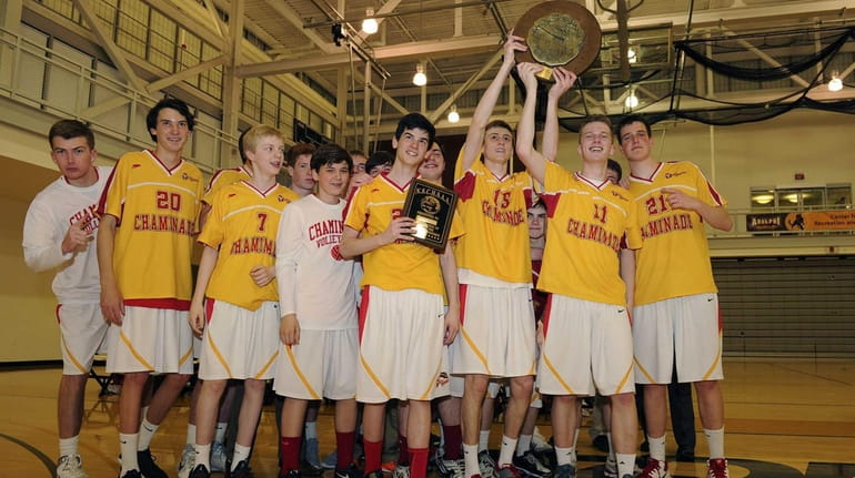 Chaminade celebrates after defeating Kellenberg for the CHSAA boys volleyball...