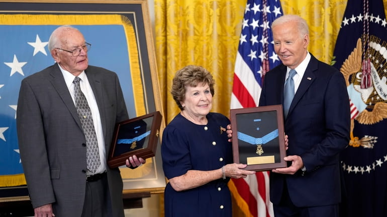 President Joe Biden presents the Medal of Honor to Theresa...