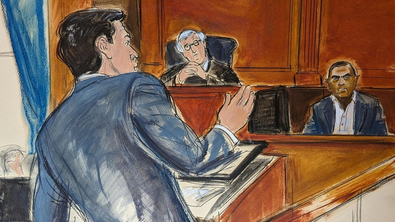 In this courtroom sketch, Robert Menendez's defense attorney Adam Fee,...