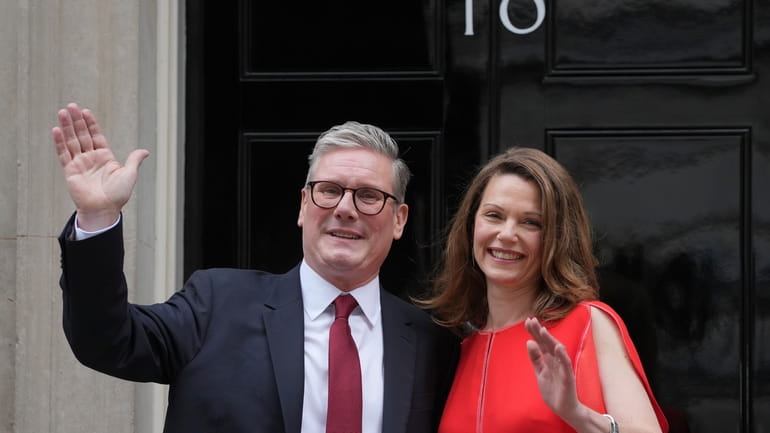Britain's Labour Party Prime Minister Keir Starmer and his wife...