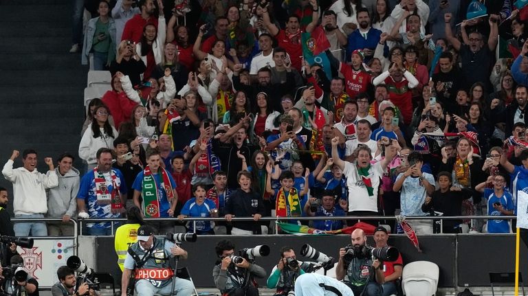 Portugal's Cristiano Ronaldo celebrates after scoring his side's second goal...