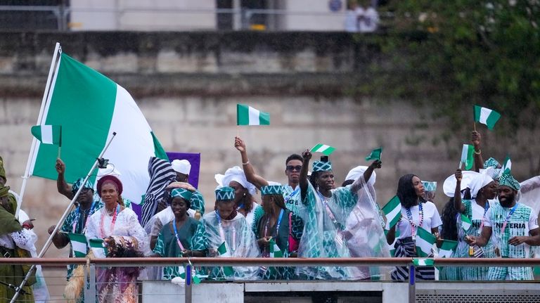 The boat carrying team Nigeria makes its way down the...