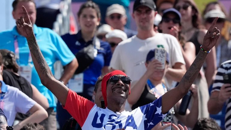 US artist Snoop Dogg attends a women's beach volleyball match...