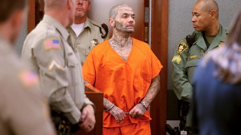 Anthony Williams, center, appears in court at the Regional Justice...