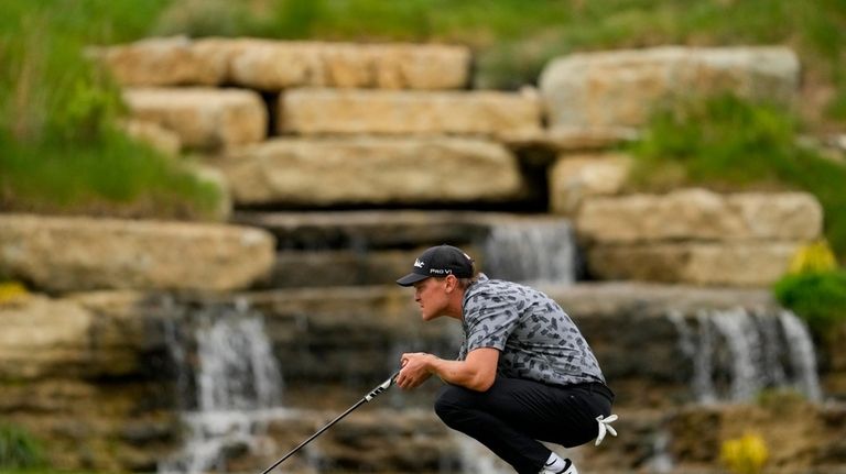 Vincent Norrman lines up a putt on the 13th hole...