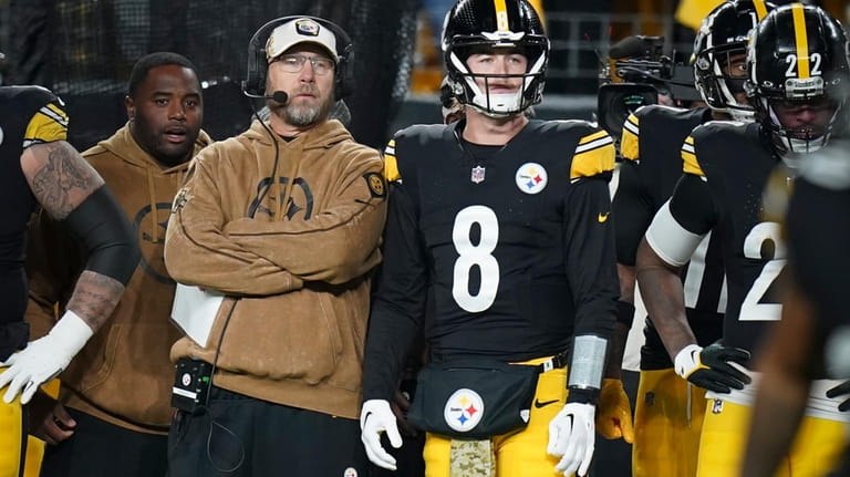 Pittsburgh Steelers offensive coordinator Matt Canada stands next to quarterback...