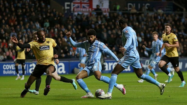 Coventry City's Ellis Simms scores their side's second goal of...