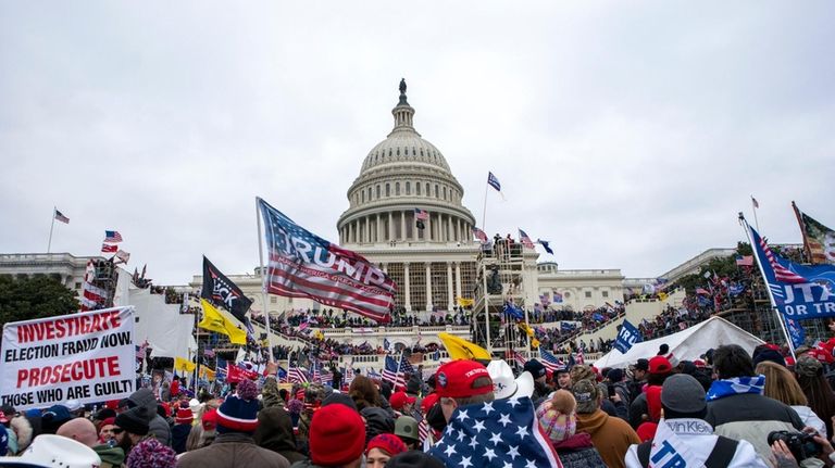 Rioters loyal to President Donald Trump rally at the U.S....