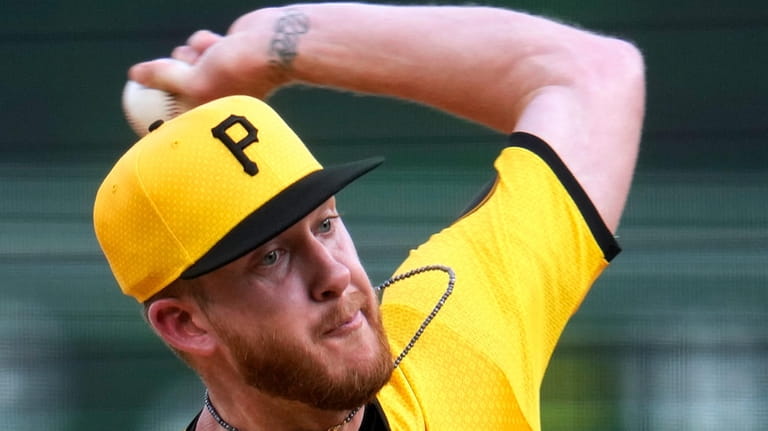 Pittsburgh Pirates starting pitcher Bailey Falter delivers during the first...