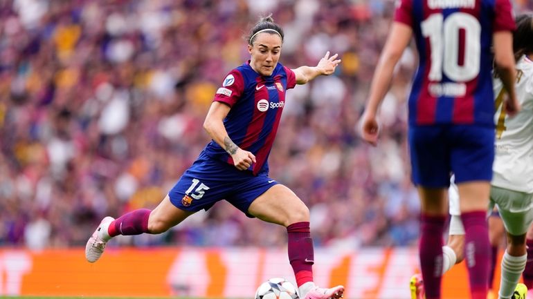 Barcelona's Lucy Bronze attempts a shot on the goal during...