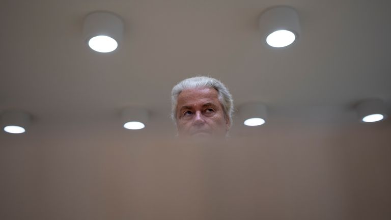 Anti-Islam lawmaker Geert Wilders takes his seat at the high...