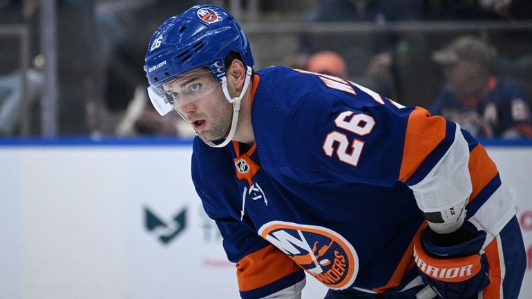 Islanders right wing Oliver Wahlstrom sets before a faceoff against...