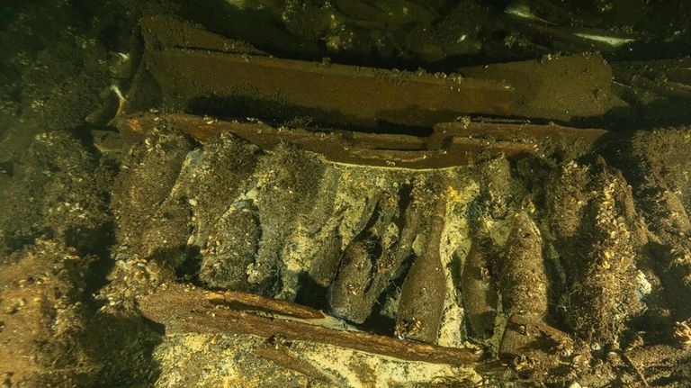 Bottles of Champagne in a 19th century sailing ship wreckage...