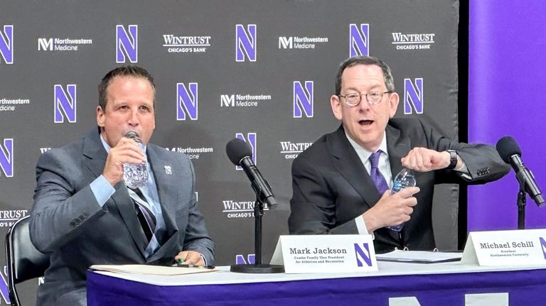 New Northwestern athletic director Mark Jackson and president Michael Schill...