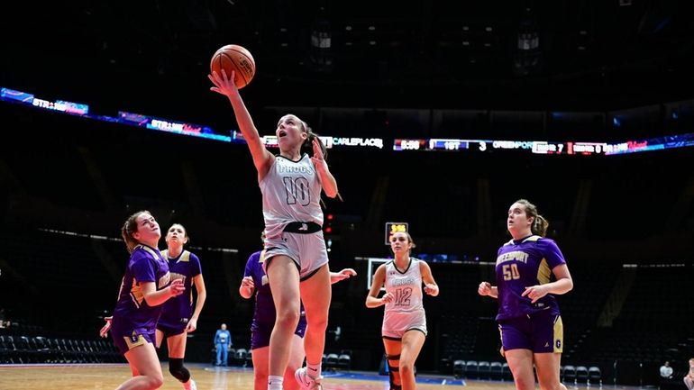 Caitlin Leary of Carle Place goes up for two during...