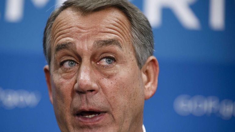 House Speaker John Boehner, of Ohio, speaks to reporters on...