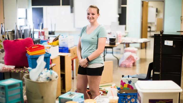 Kindergarten school teacher, Shannon Raftery poses for a photograph in...