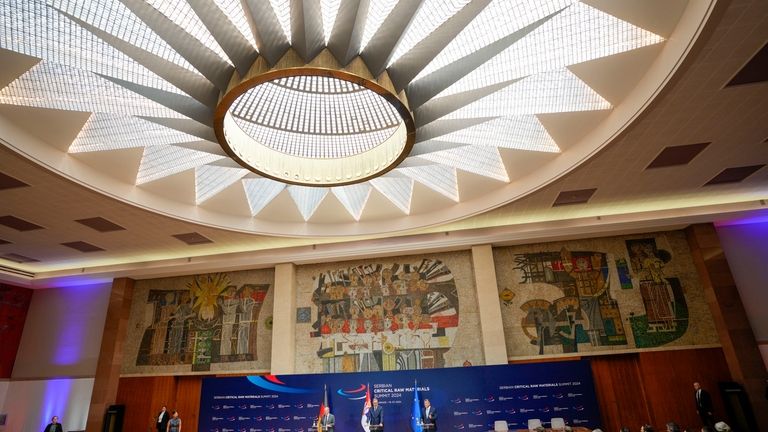 Serbian President Aleksandar Vucic, center, speaks during a press conference...