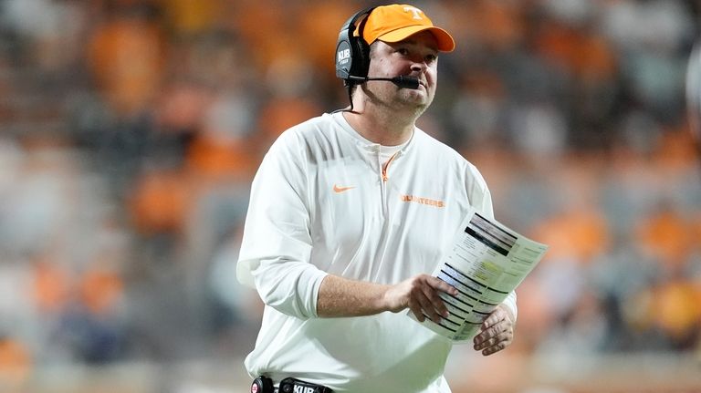 Tennessee head coach Josh Heupel looks onto the field during...