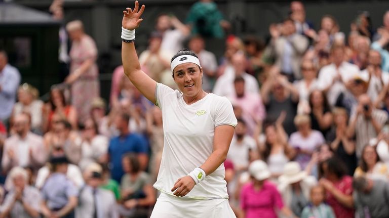 Tunisia's Ons Jabeur celebrates beating Aryna Sabalenka of Belarus to...