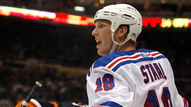 Rangers defenseman Marc Staal celebrates after scoring a goal against...