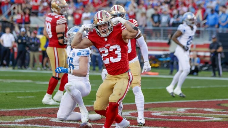 San Francisco 49ers' running back Christian McCaffrey (23) reacts after...