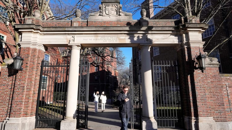 An entrance to the Harvard University campus in Cambridge, Massachusetts. Many colleges...