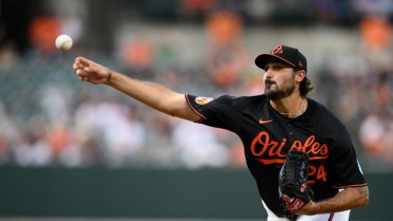 Baltimore Orioles starting pitcher Zach Eflin throws during the first...