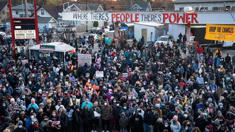 Demonstrators gather outside Cup Foods to celebrate the murder conviction...