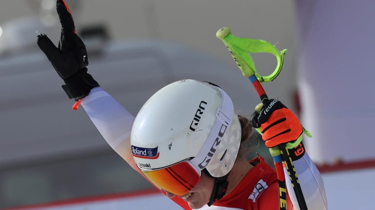Switzerland's Jasmine Flury reacts after completing an alpine ski, women's...