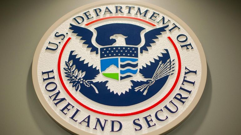 Homeland Security logo is seen during a joint news conference...