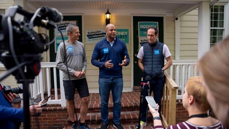 Maryland Gov. Wes Moore, center, Virginia Delegate Rodney Willett, left,...