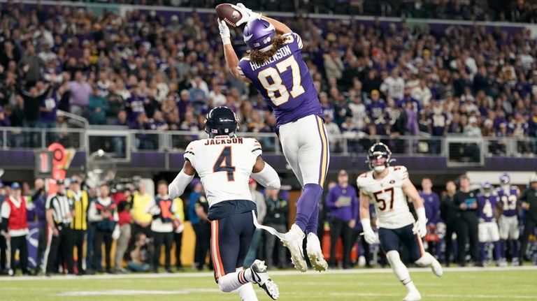 Minnesota Vikings tight end T.J. Hockenson (87) catches a 17-yard...