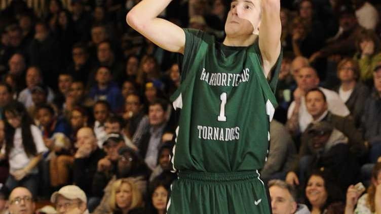 Harborfields guard Lucas Woodhouse shoots a three-pointer against William Floyd....