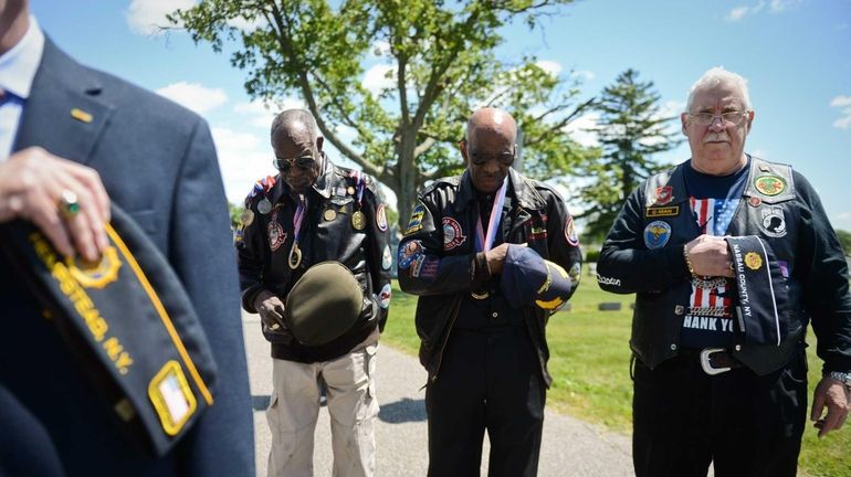 Tuskeegee Airmen Julius Freeman, left, William Thomas Jr. and Frank...