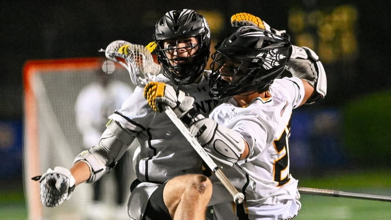 Dylan Martini of Wantagh (left) and teammate Joe Nicholson of...