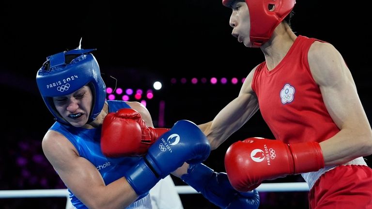 Taiwan's Lin Yu-ting, right, fights Poland's Julia Szeremeta in their...