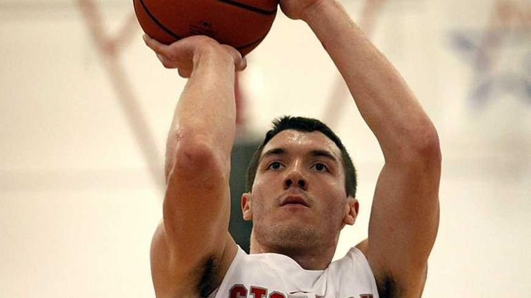 Stony Brook's Tommy Brenton (24) shoots the free throw line...