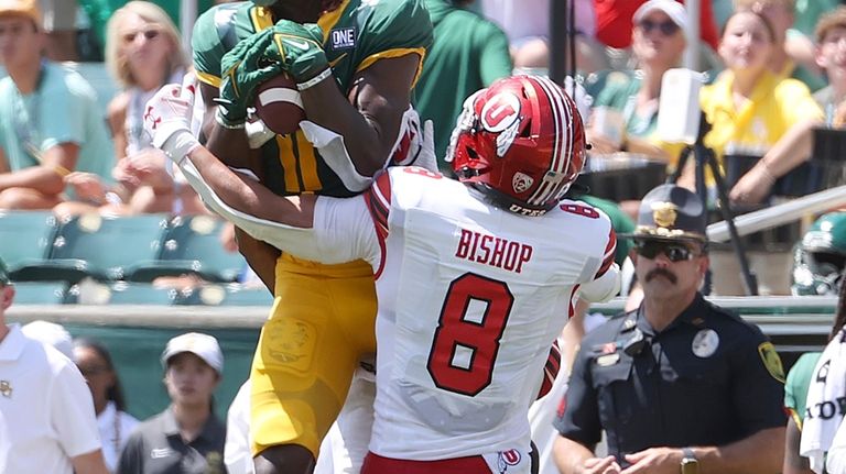 Baylor wide receiver Ketron Jackson Jr. (11) catches the ball...