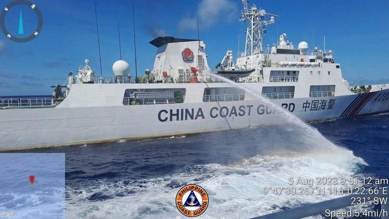 In this handout photo provided by the Philippine Coast Guard,...