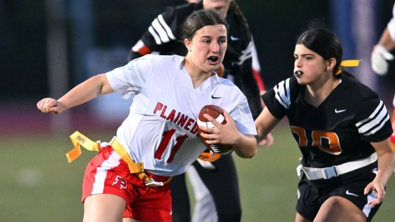 Plainedge's Jessica Faranda runs during the Nassau Class B flag...