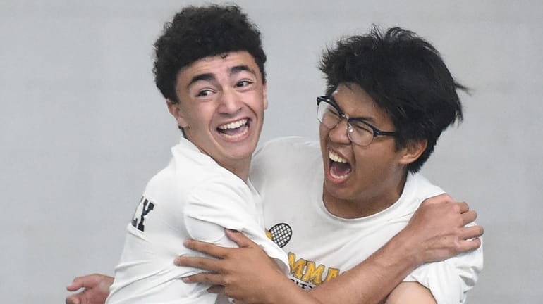 Eric Benderly of Commack, left, and teammate James Yu celebrate...